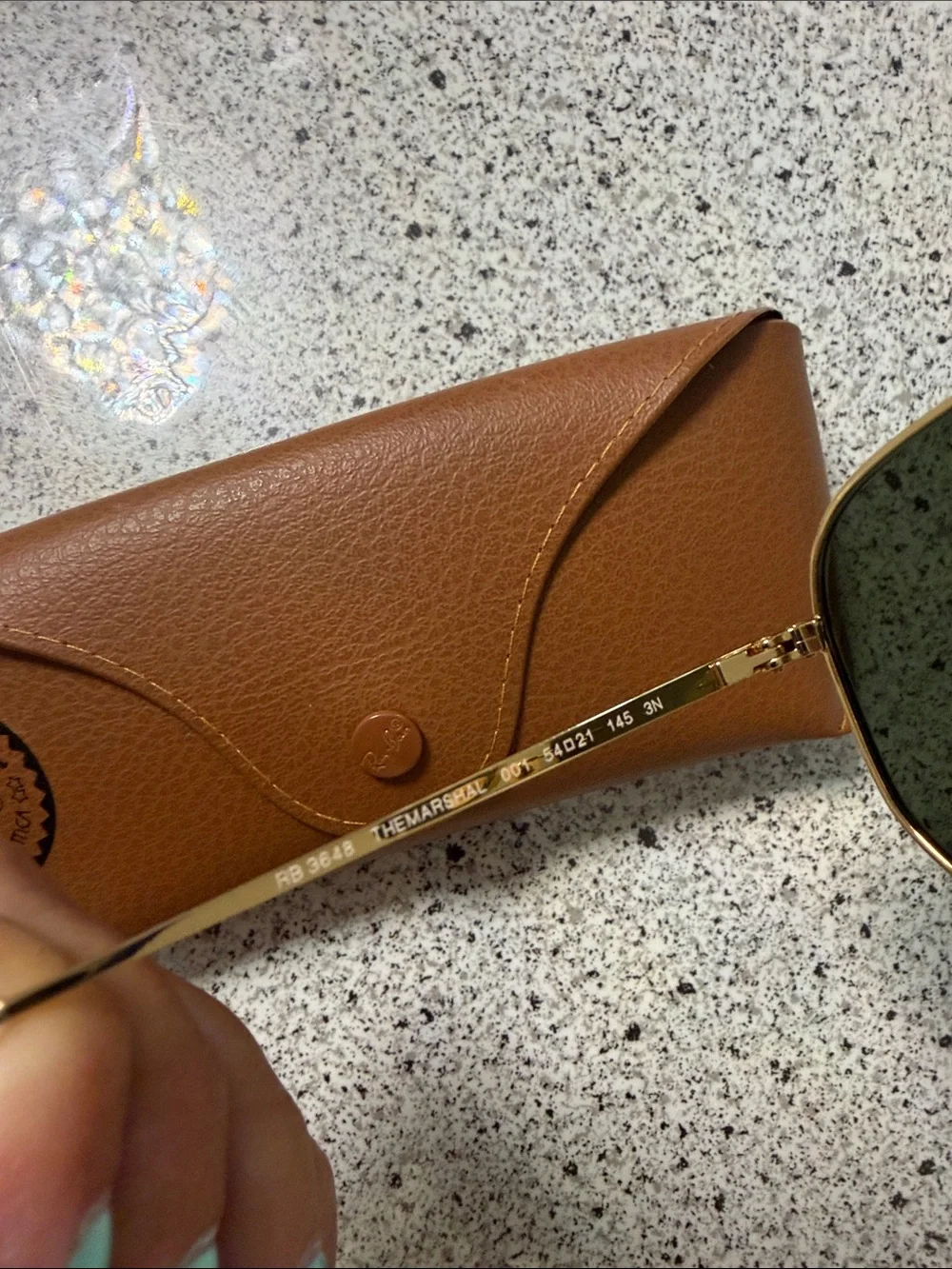 Ray-Ban case included